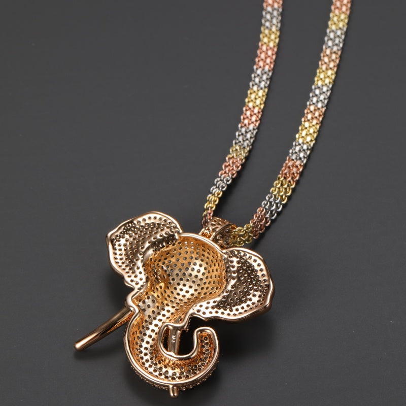 RoundLiving Diamond-Studded Gold Elephant Pendant Necklace.